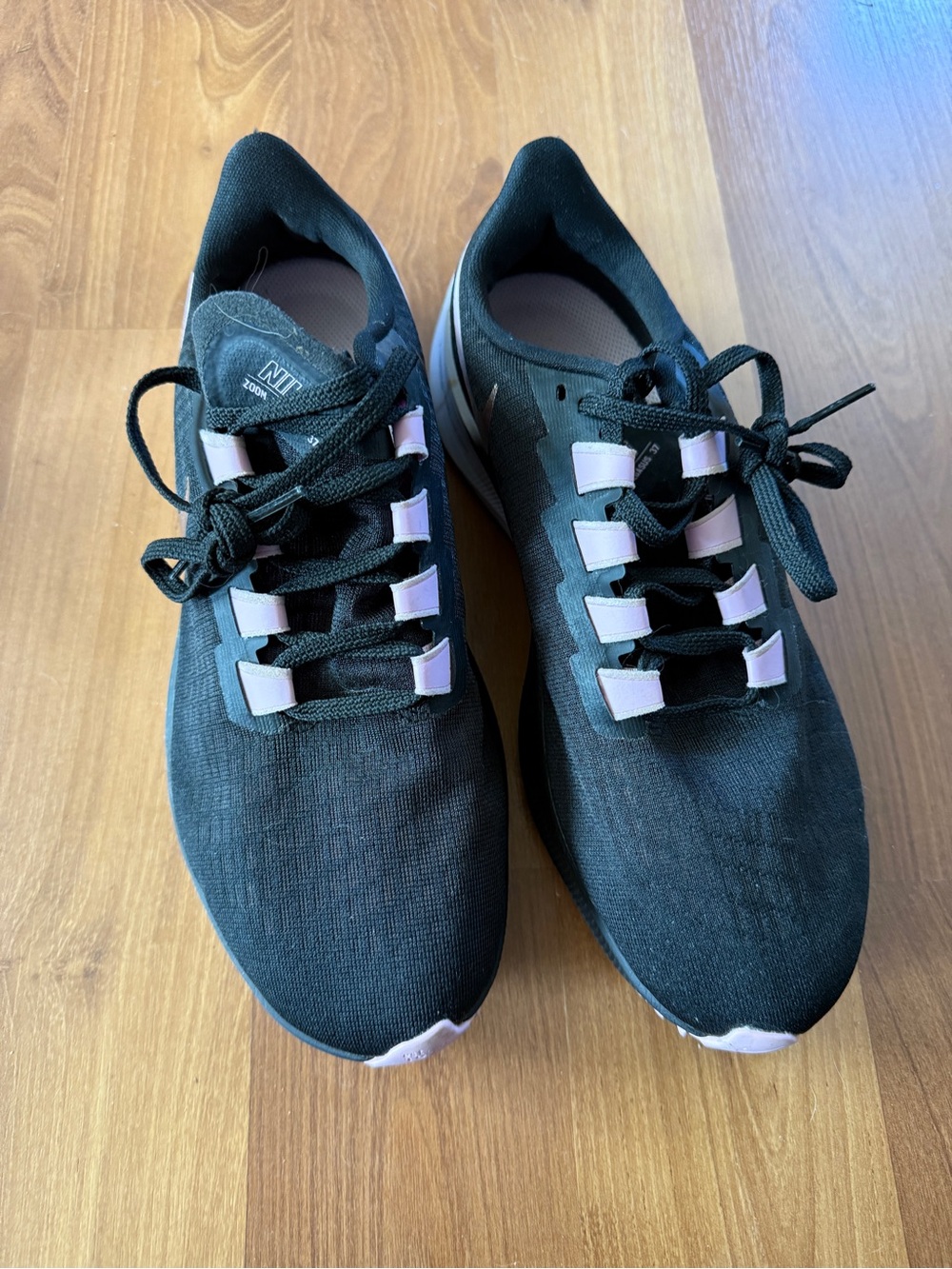 Nike Black Athletic Sneakers with Light Pink Accents